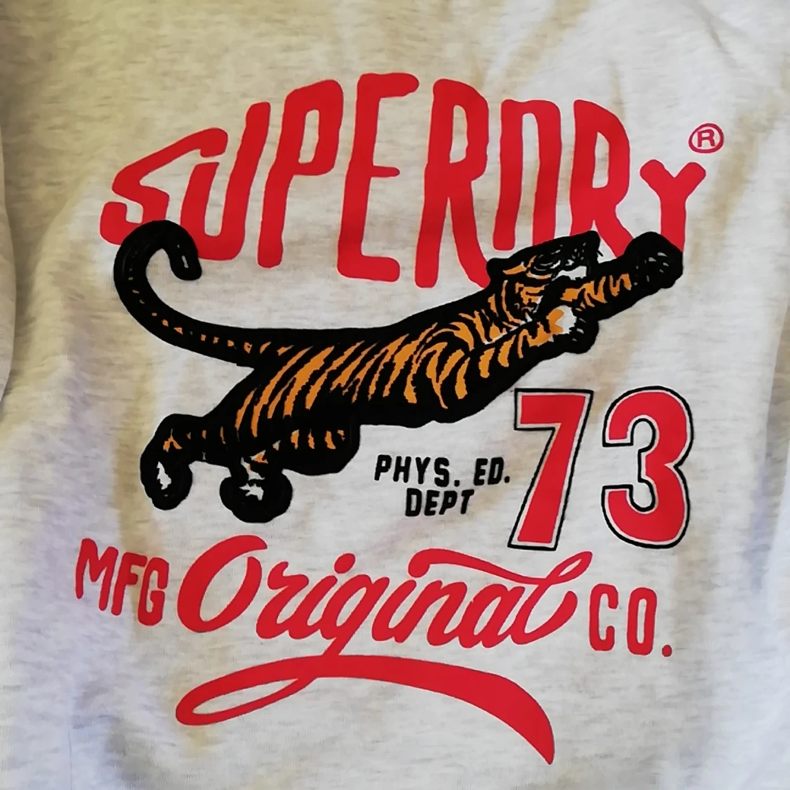 Collegetröja från SuperDry strl. M - 91