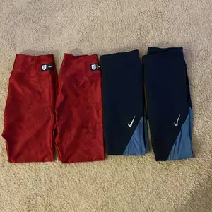Två olika par Nike träningsbyxor, Båda är i storlek S dam! De röda byxorna är limited edition, Nike/england vilket ni er på 3 bilden, går ej att köpa mer. Hör av er vid frågor:) 100kr/st blåa, 150kr/st röda