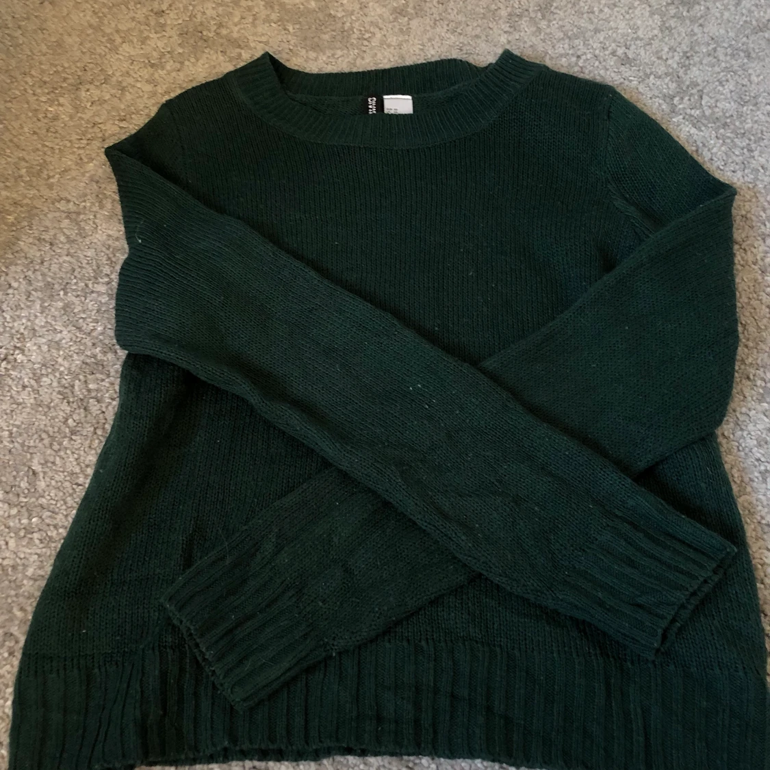 Stickad grön tröja