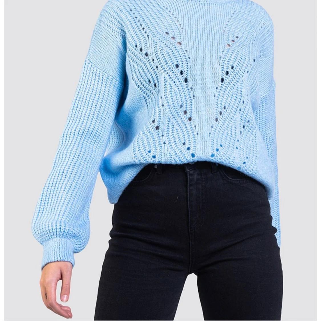 Ljusblå stickad tröja