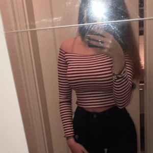 Half white-red shirt  - Off shoulder, runs Size S and runs tight around your body very light as well. 