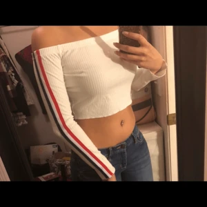Short off shoulder white top - White top with red and black stripped on the side, runs small! Size S 