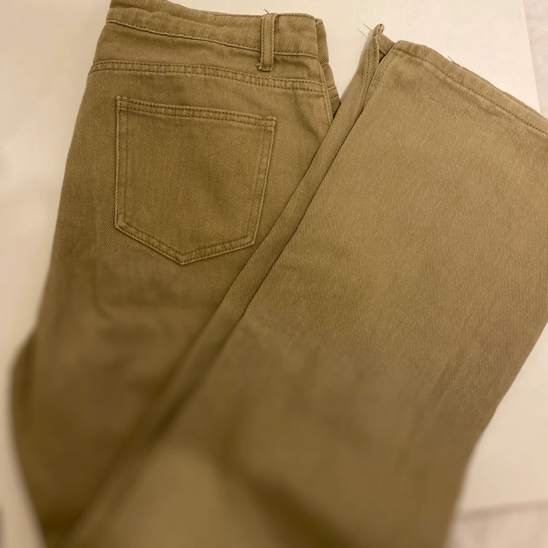 Knapp slätt jeans i storlek L - 90