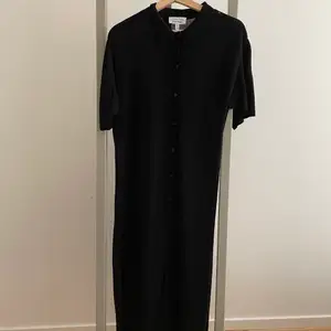 Long button down cotton dress from other stories. Small hole by the collar that can easily be mended. 