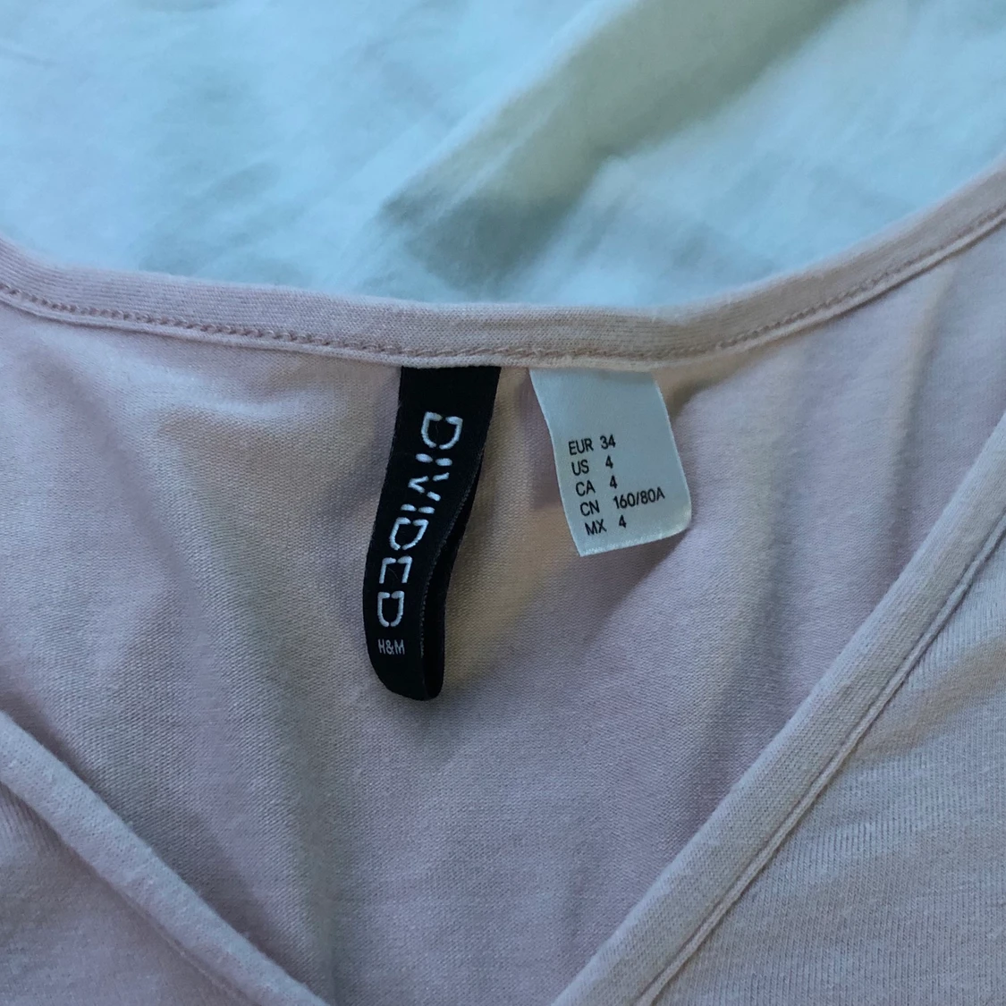 Ljusrosa omlott klänning  - 91