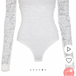 Spets body  - Säljer denna jättefina spets body från Nelly då den inte kommer till användning längre. 