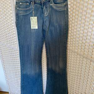 Ljusblåa jeans, W 27