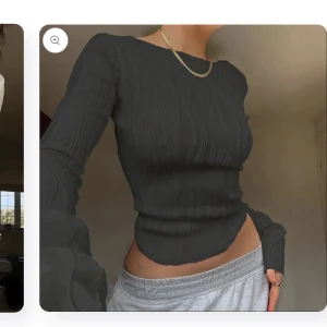 Oanvänd svart topp - Oanvänd svart supersnygg topp från Couturix. Något kort för mig därav säljer jag den. Köparen står för frakten