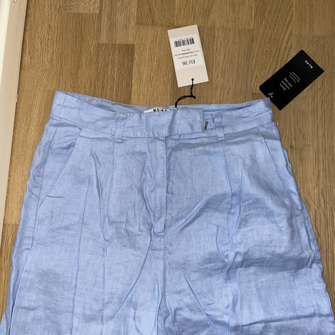 Blåa linnekostymbyxa - 91