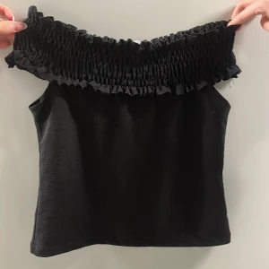 Off shoulder topp - Svart fin topp, strl s. Aldrig använd.