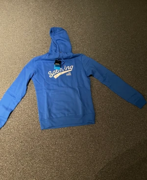 Salming logo hoodie - Oanvänd hoodie ifrån de populära märket Salming 