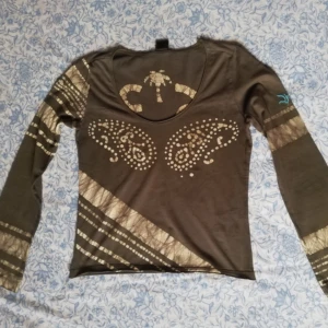 Vintage Diesel - Brun paisley vintage Diesel med klockad ärm. 