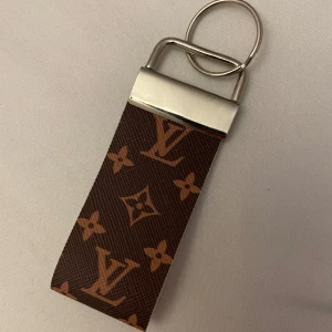 Nyckelring - Aldrig använd ej äkta