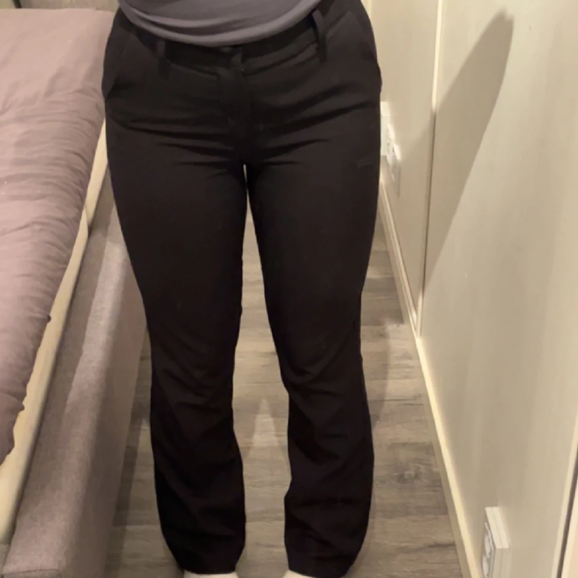 Svarta kostymbyxor