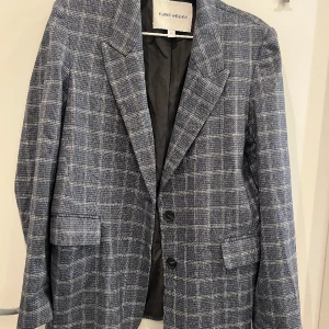 Kavaj - Sparsamt använd 