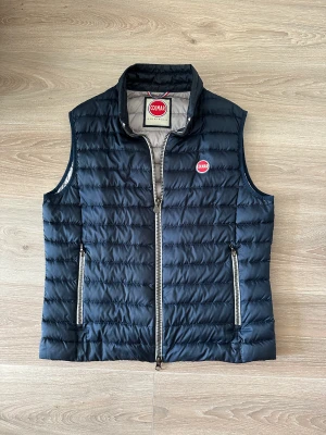 Colmar väst - Colmar väst i storlek 52(M-L)  Mycket bra sick! 