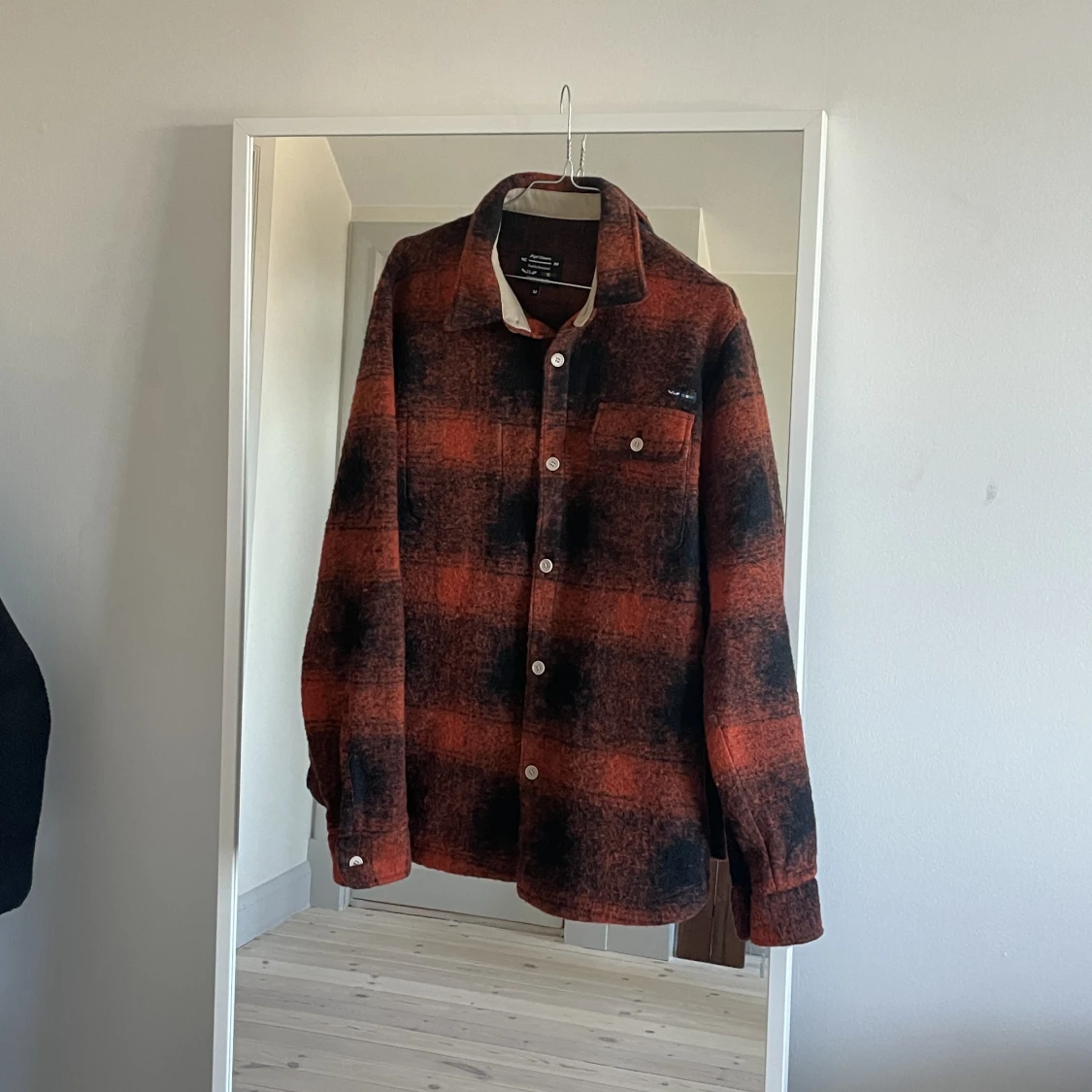 Ull-jacka i rutig design