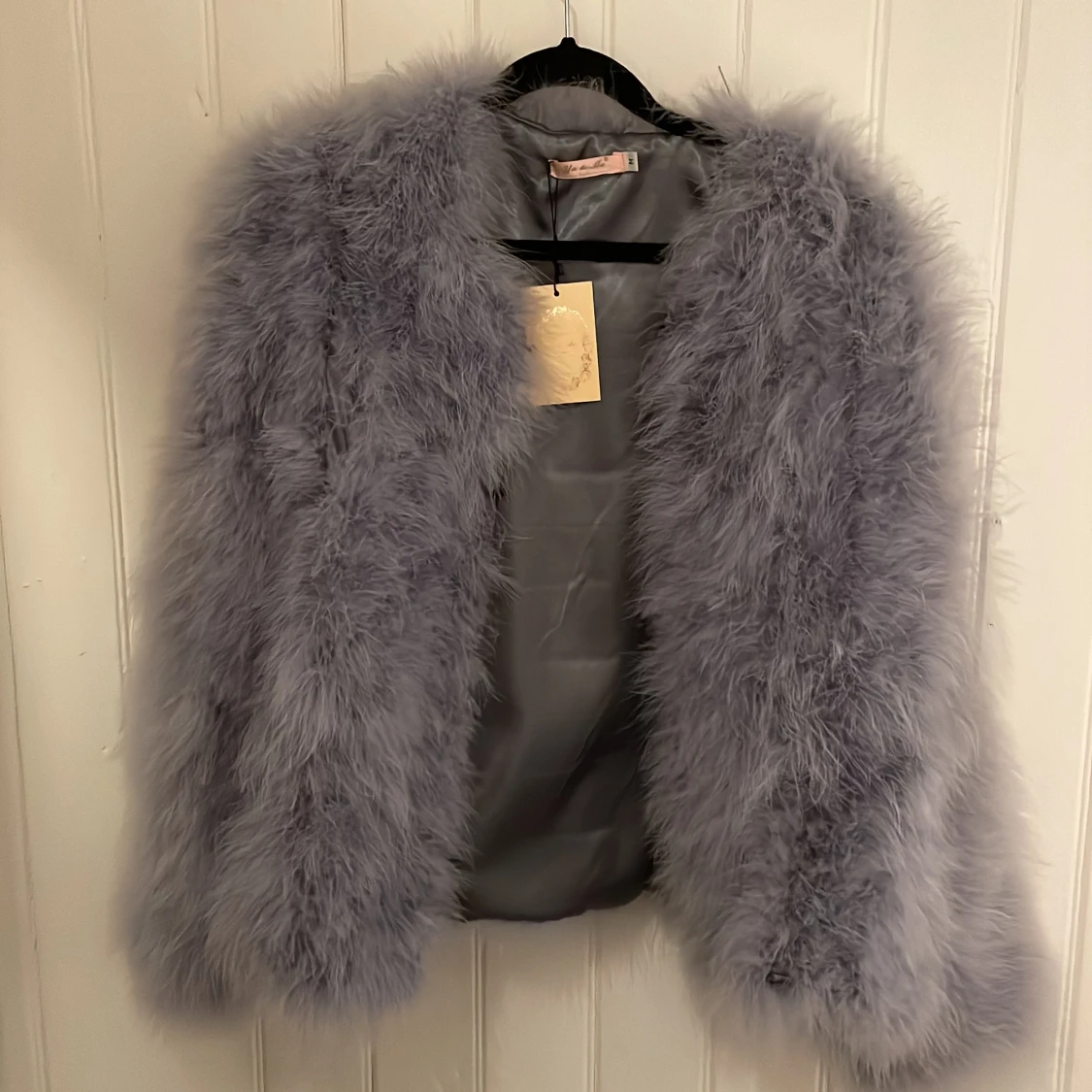 jacka/kavaj strutsfjäder