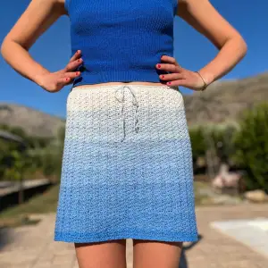 Crochet skirt made with gradient yarn. Fits XS/S but is adjustable in the waist.