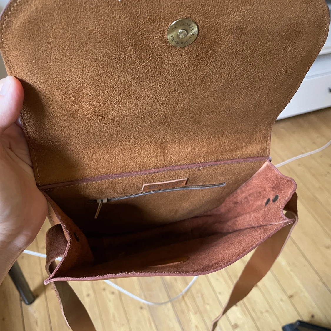 Small leather bag with a long shoulder strap - 91