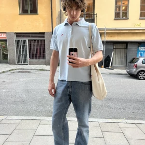 Burberry piké - Riktigt schysst burberry piké! Alla plagg jag säljer är äkta och detta är inget undantag. ”Made in England” i 100% bomull. Storlek S, något oversized så funkar bra till en M också