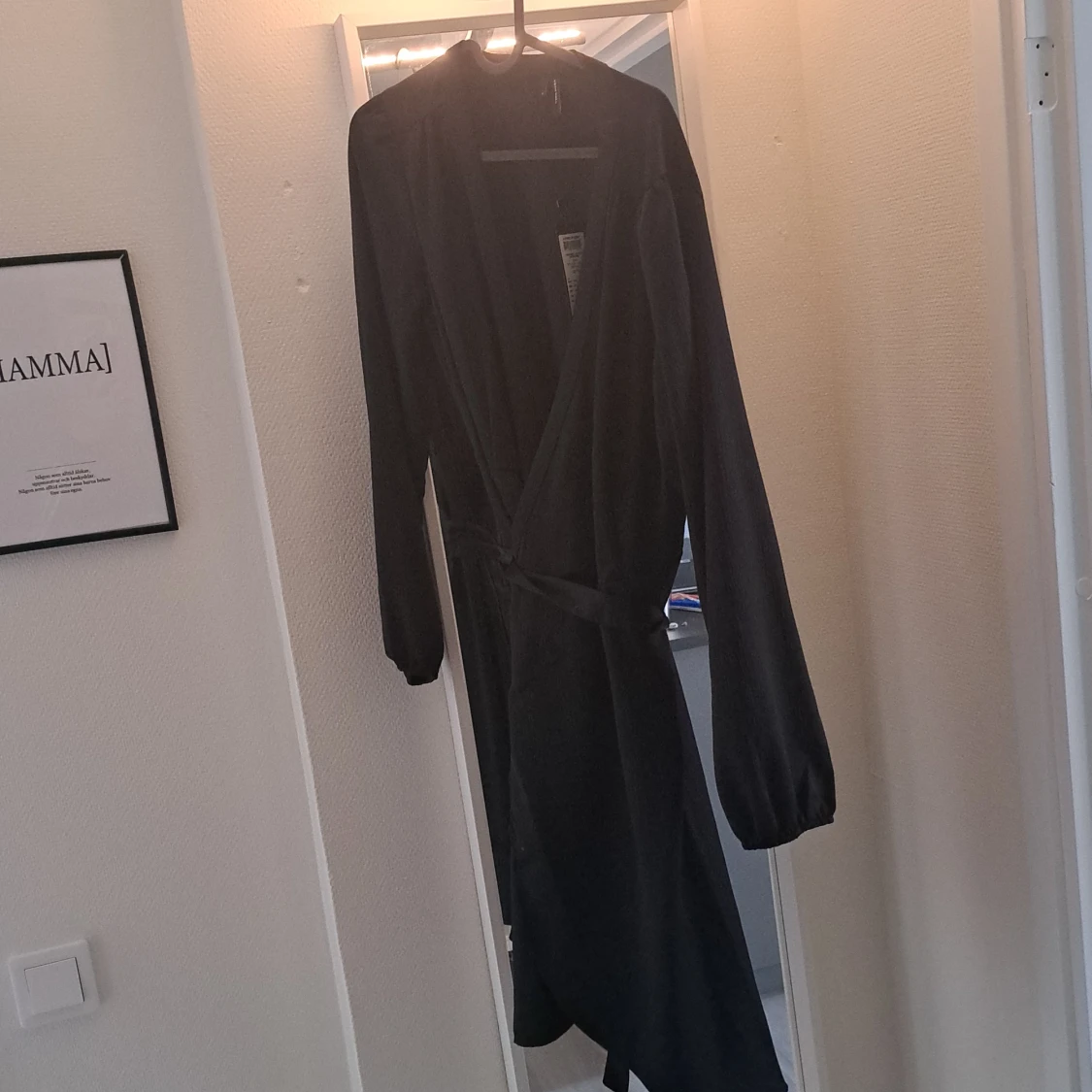 Långärmad klänning