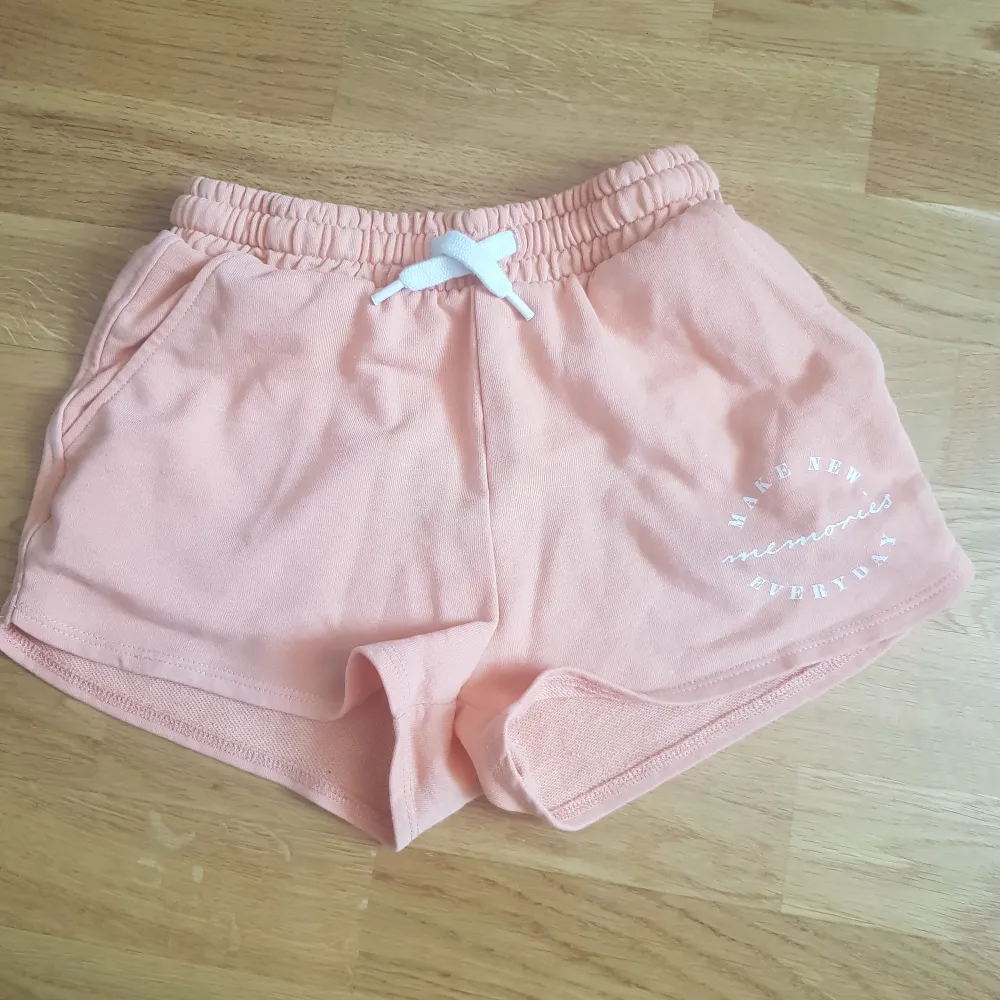 Orange mid-wasted shorts, almost new! . Shorts.