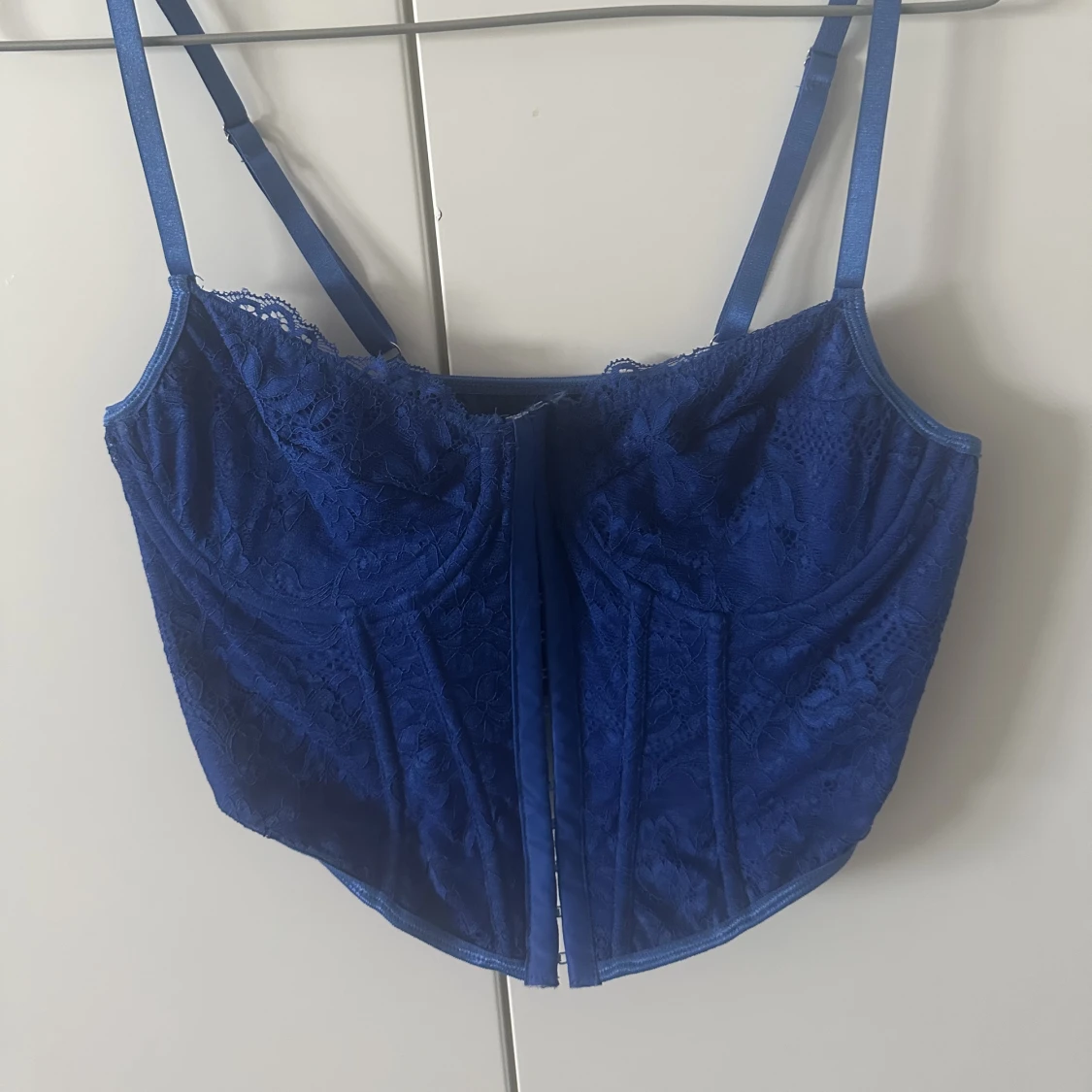 Blå korsetttopp 