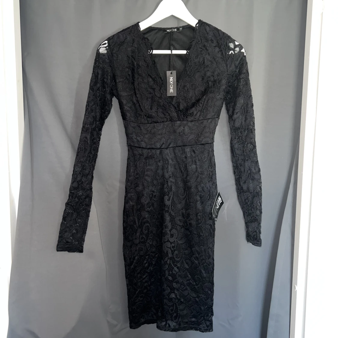 Svart spetsklänning 