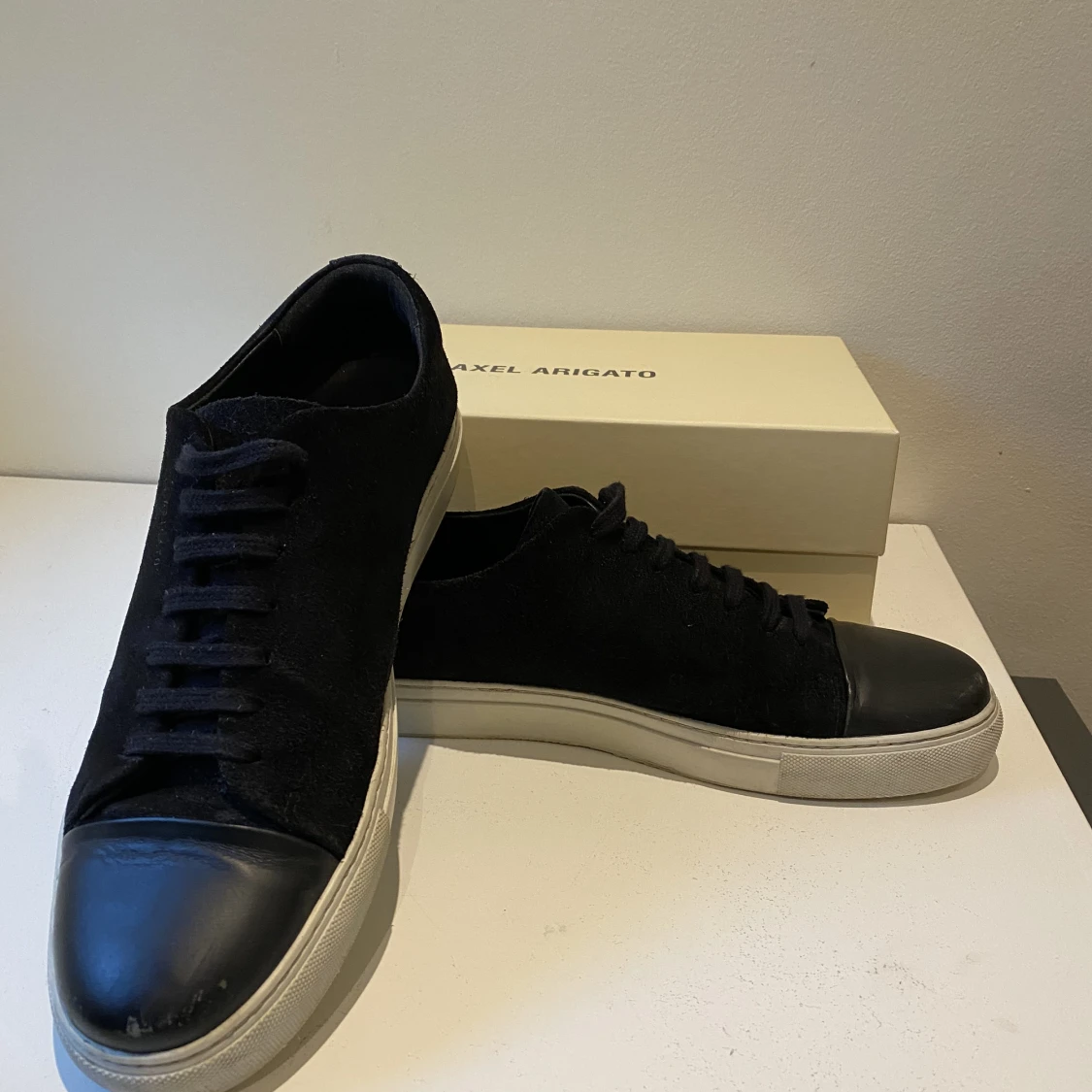Axel Arigato skor