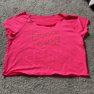 Träningströja - Kort tränings tröja en rosa fin 