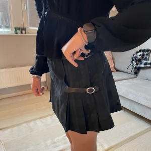 Grönrutig kjol Brandy Melville - Grönrutig kjol från Brandy Melville 