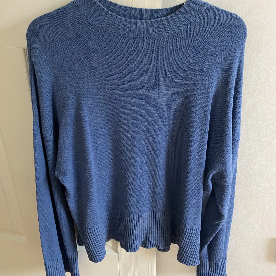 Blå stickad tröja LXA