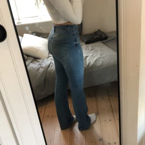 Ljus blå high wasit jeans - Strlk w27 l34