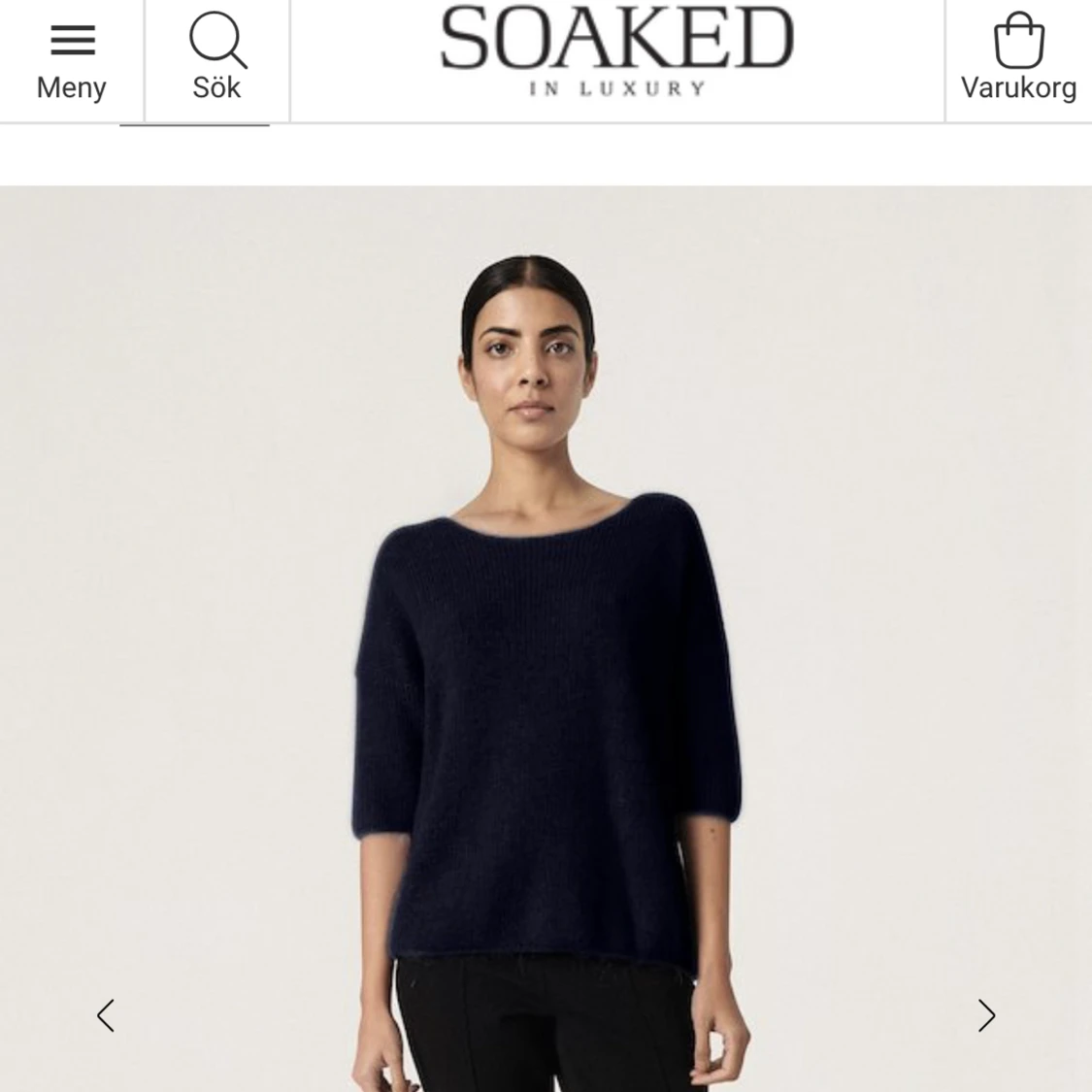 Stickad kortärmad tröja