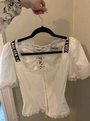 I.AM.GIA korsett blus  - Snygg korsett blus/top från I.AM.GIA. Endast använd en gång.