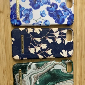 Mobilskal iPhone 6s, 6, 7, 8, SE - Jag säljer 3st mobilskal för att jag ska byta telefon. Ett mobilskal är från onsala collection och 2 från ideal of Sweden 50kr st 120kr tillsammans det gröna har en liten bit borta men det märks inte så mycket skicka gärna prisförslag och kontakta gärna.