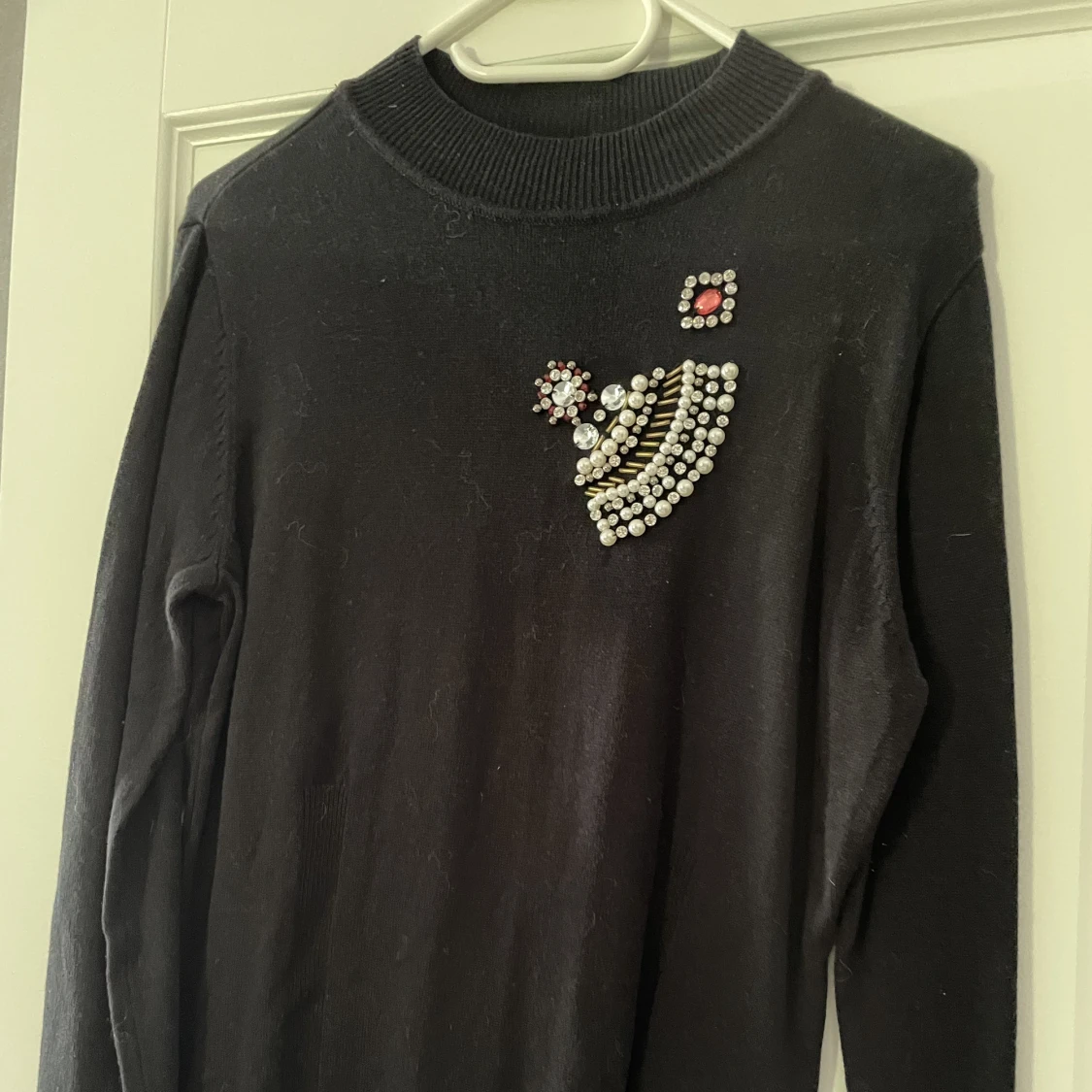 Svart tröja med blingbling