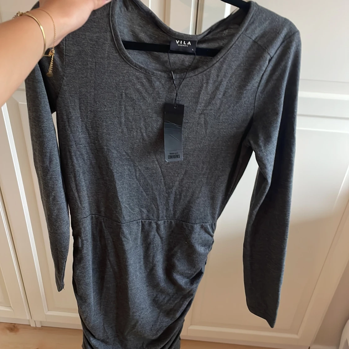 Långarmad klänning  - 91