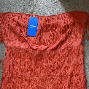 Tube topp - Köpte denna på Plick här om dagen men tyvärr så passade inte den mig i storleken. Den är så himla snygg men tyvärr. Ser att den är inköpt på asos och lappen sitter kvar för både asos och sellpy. Den är i storlek 42