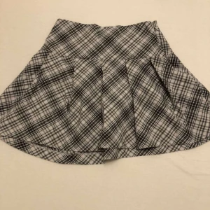 Mönstrad tjol - Har en dragkedja.