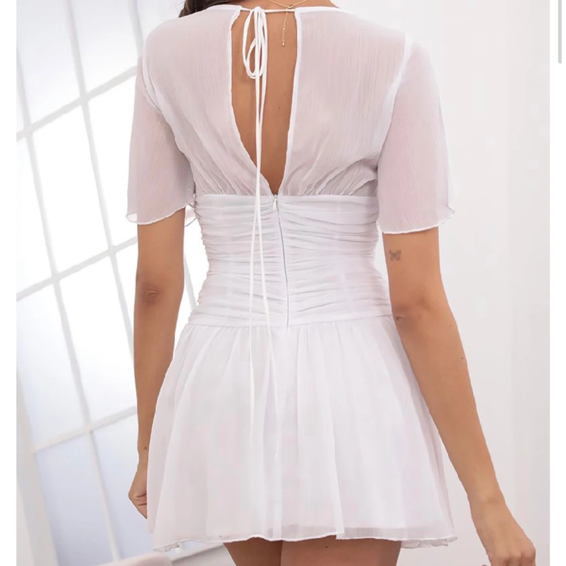 Vit miniklänning - 90