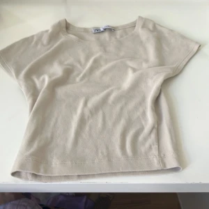 Storlek S -  Beige  Storlek S