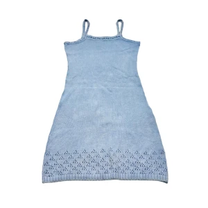 Stickad klänning  - Uppskattad storlek 