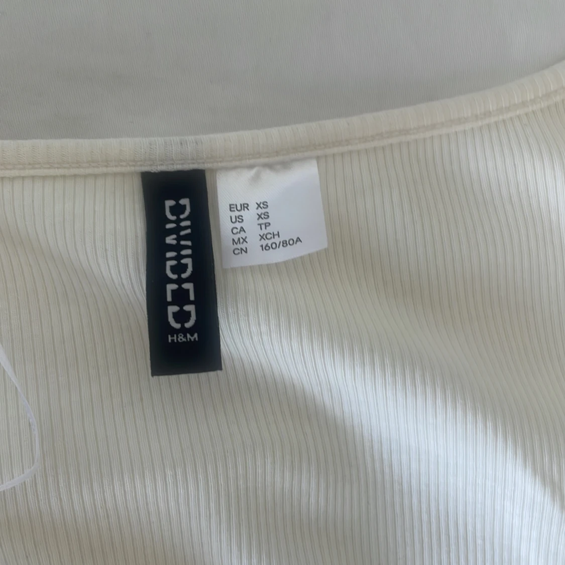 Långärmad ribbad tröja - 1