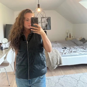 Skinnväst - Använd fåtal gånger