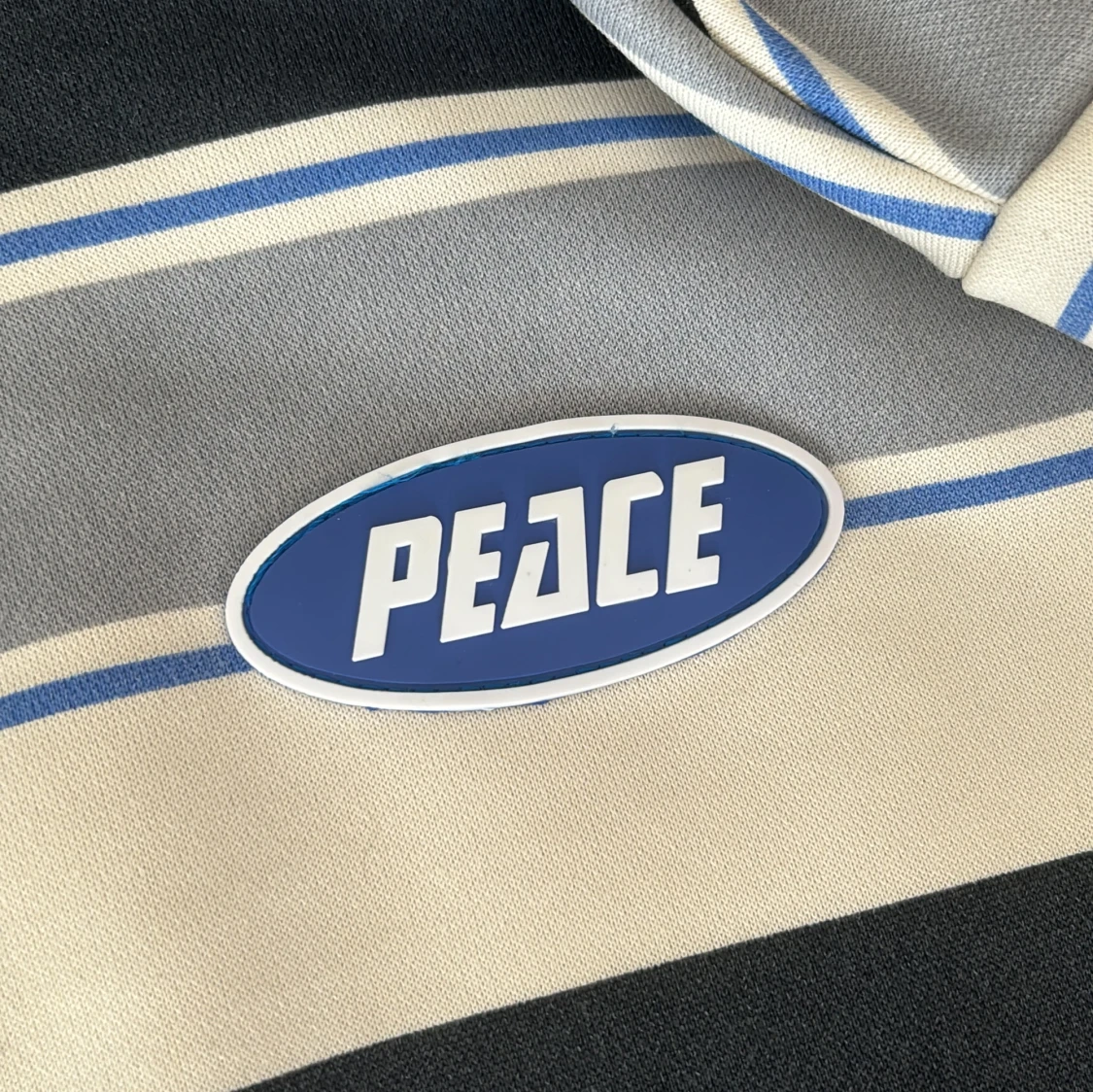 Randig tröja från Peace - 90