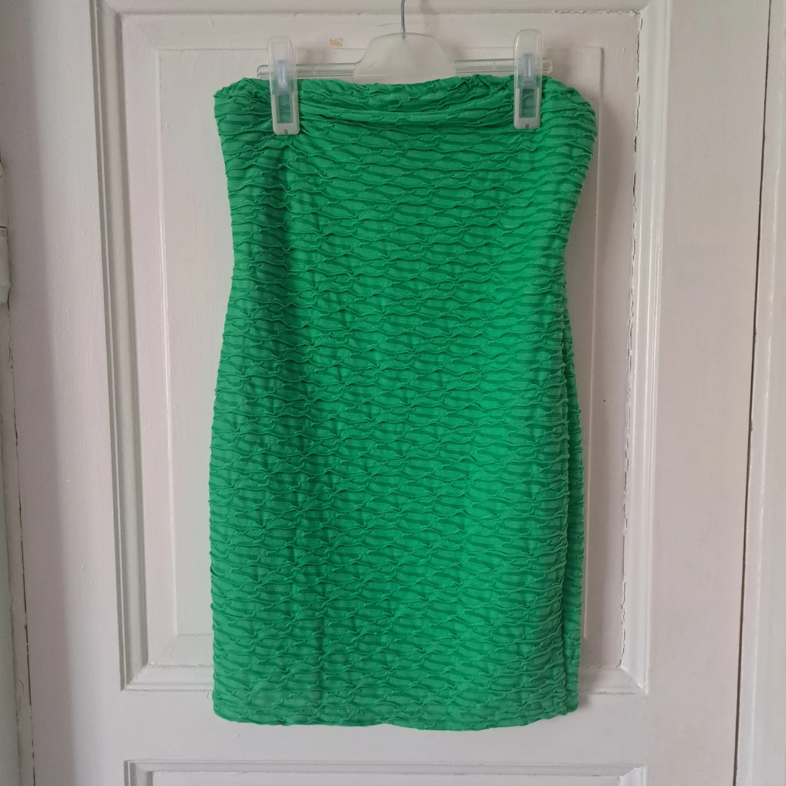 Axelbandslös klänning