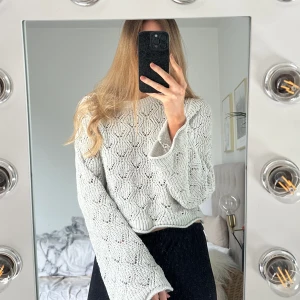 En stickad tröja från en butik i LA. - Storlek M 