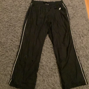Nike trakpants - W30-32 L30